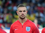 Angielski pomocnik Jordan Henderson doznał kontuzji nadgarstka, przeskakując nad tabliczką reklamową podczas świętowania