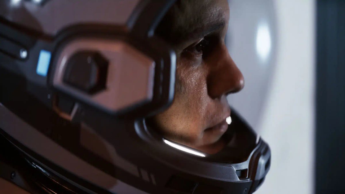 A close-up shot of a character wearing a futuristic space helmet in Directive 8020.